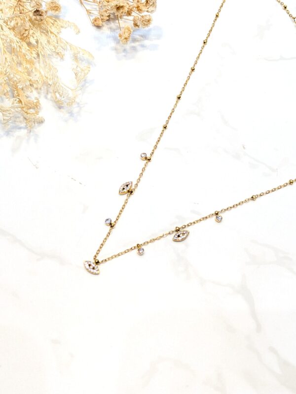 Collier oeils charms strass doré acier inoxydable