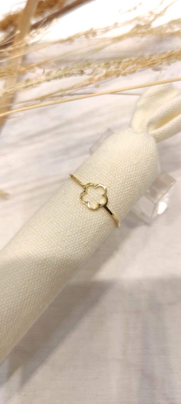 Bague fleur réglable dorée acier inoxydable