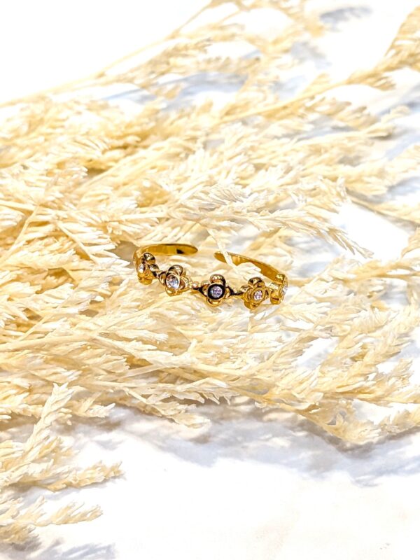 Bague mini fleur réglable dorée acier inoxydable