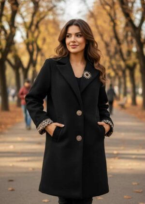 Manteau noir et léopard avec broche soleil du S au 5xl
