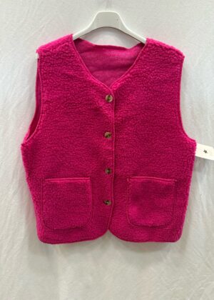 Gilet sans manche moumoute poches et boutons fushia