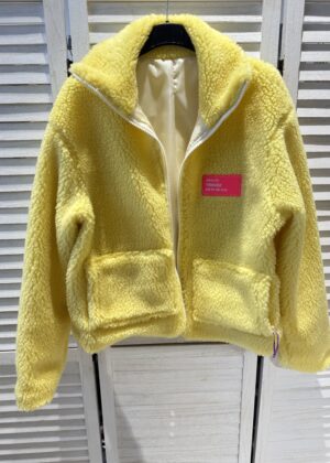 Veste teddy doublée jaune avec poche et patch rose fluo