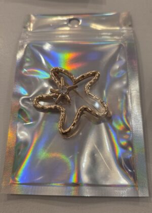 Broche dorée étoile strass