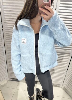 Veste teddy doublée bleu ciel avec poche et patch