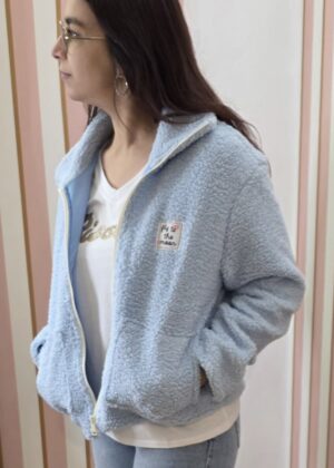 Veste teddy doublée bleu ciel avec poche et patch